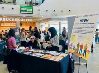 GLOCAL outreach table at a volunteer fair.